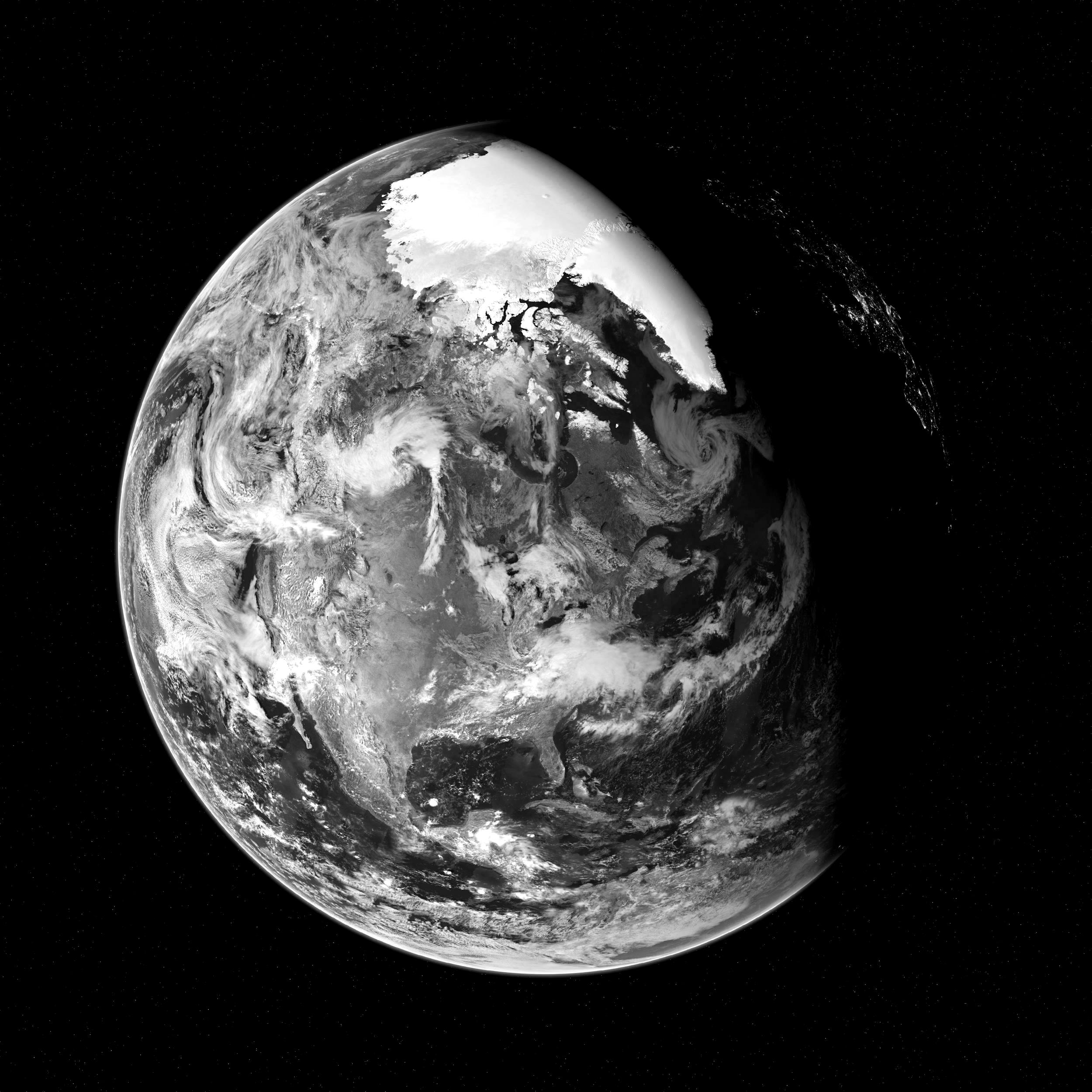 A black and white picture of the earth.  Decorative front page of climateninja.org.